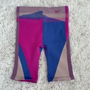 Nike Biker Shorts - only worn ONE time! Size: medium. Color: blue, pink, & tan